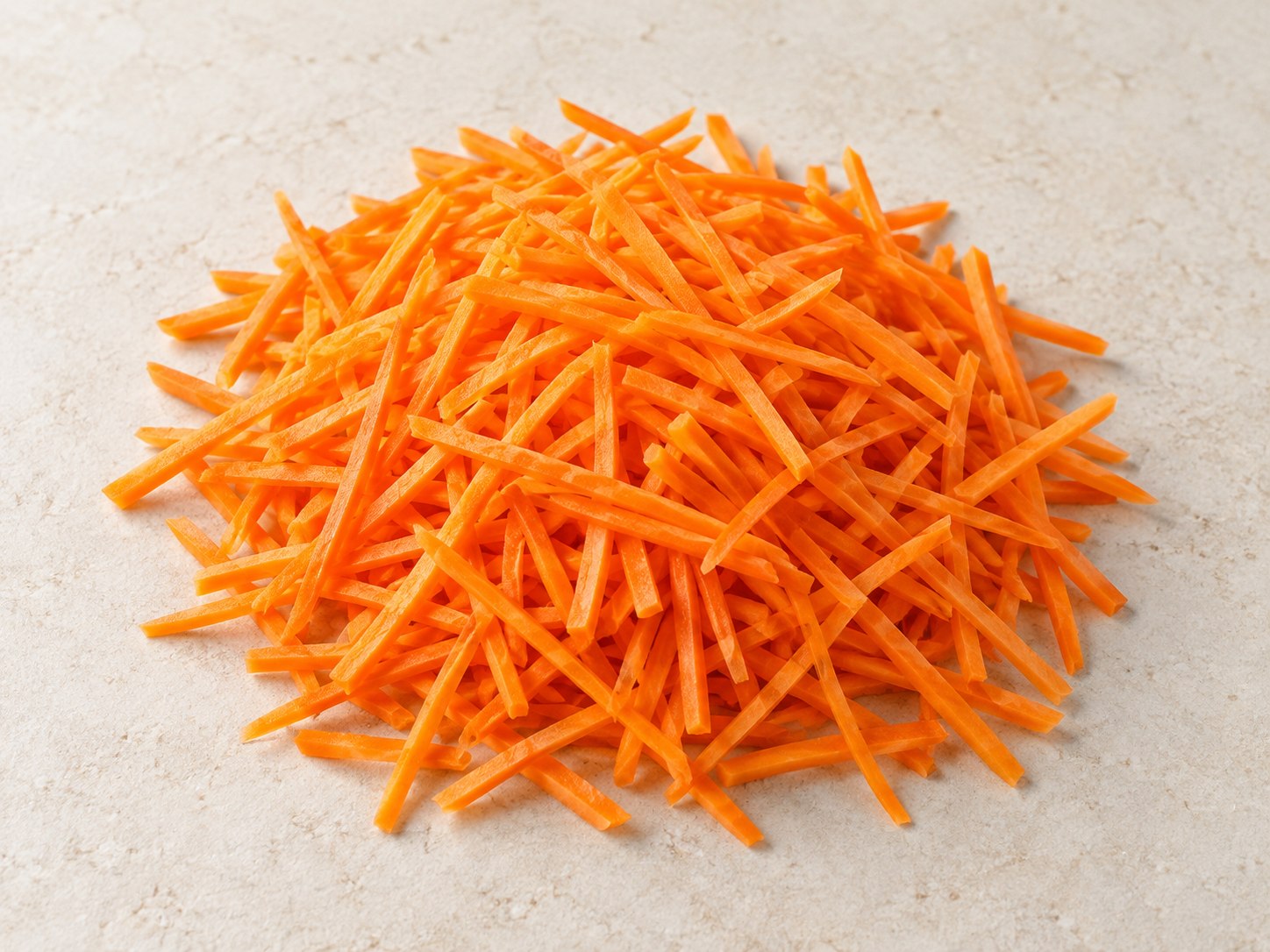 Carote fresche tagliate a julienne da cuocere